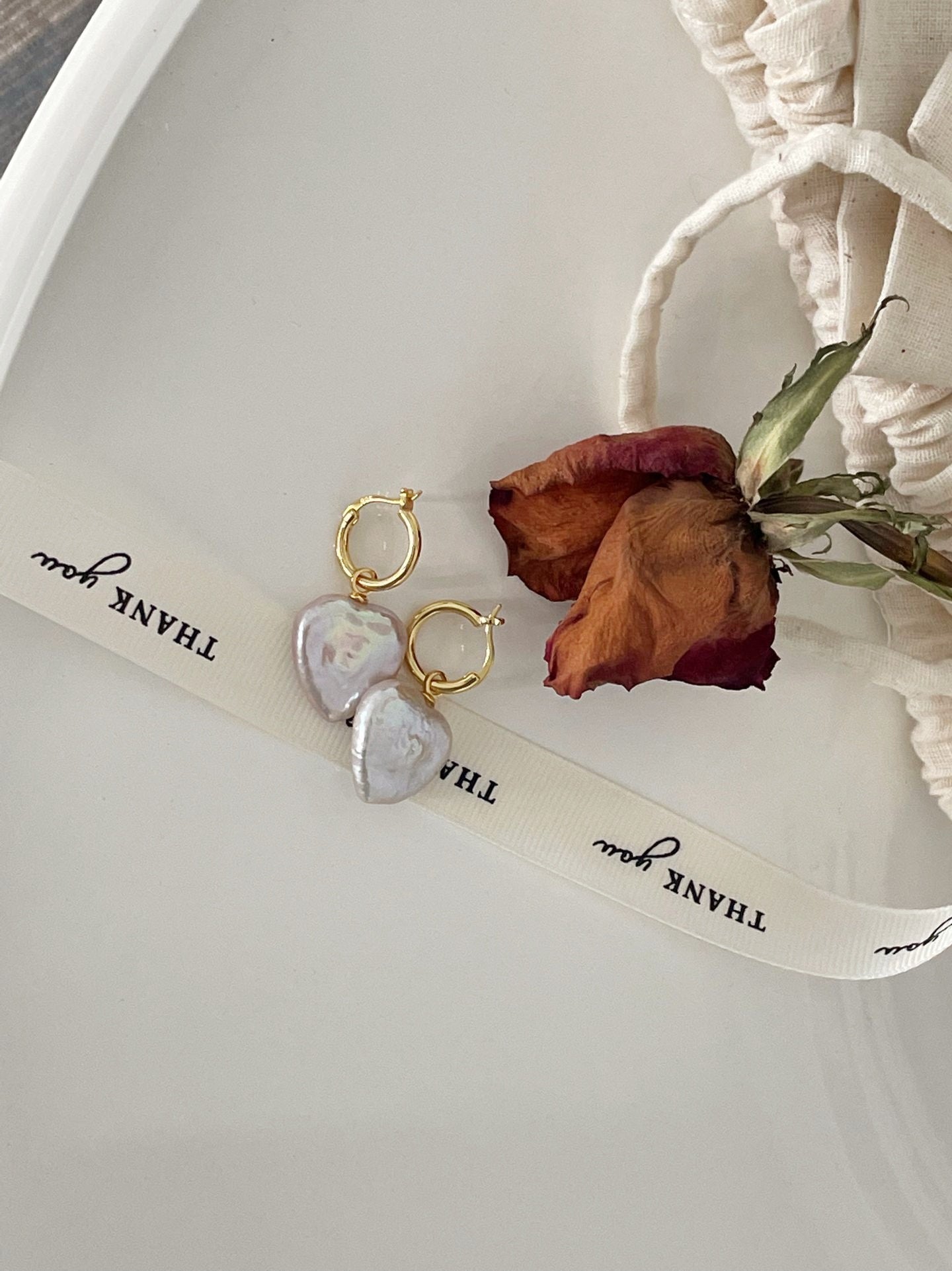 Orecchini con perle barocche cuore