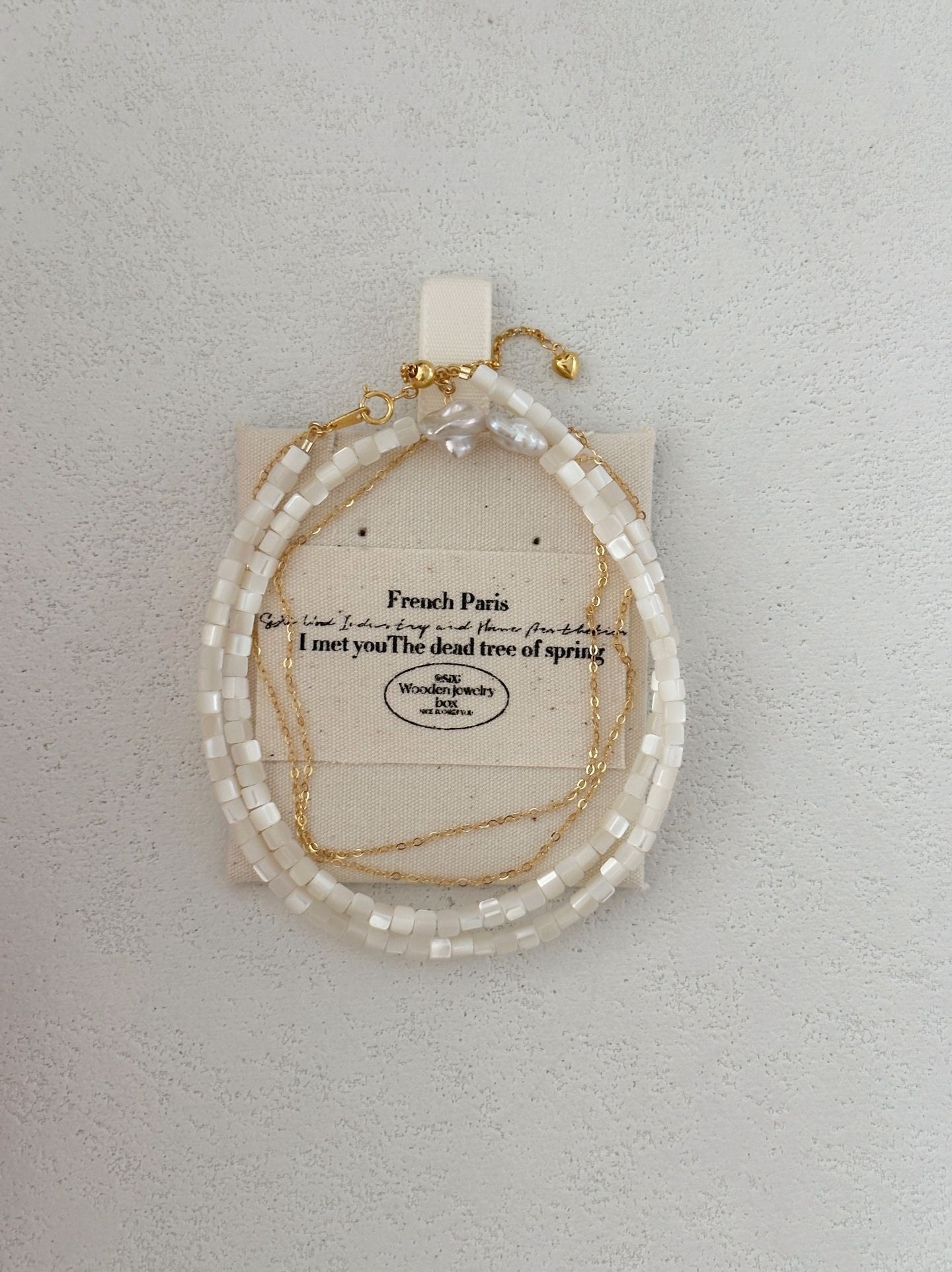 Collana a doppio giro con conchiglia
