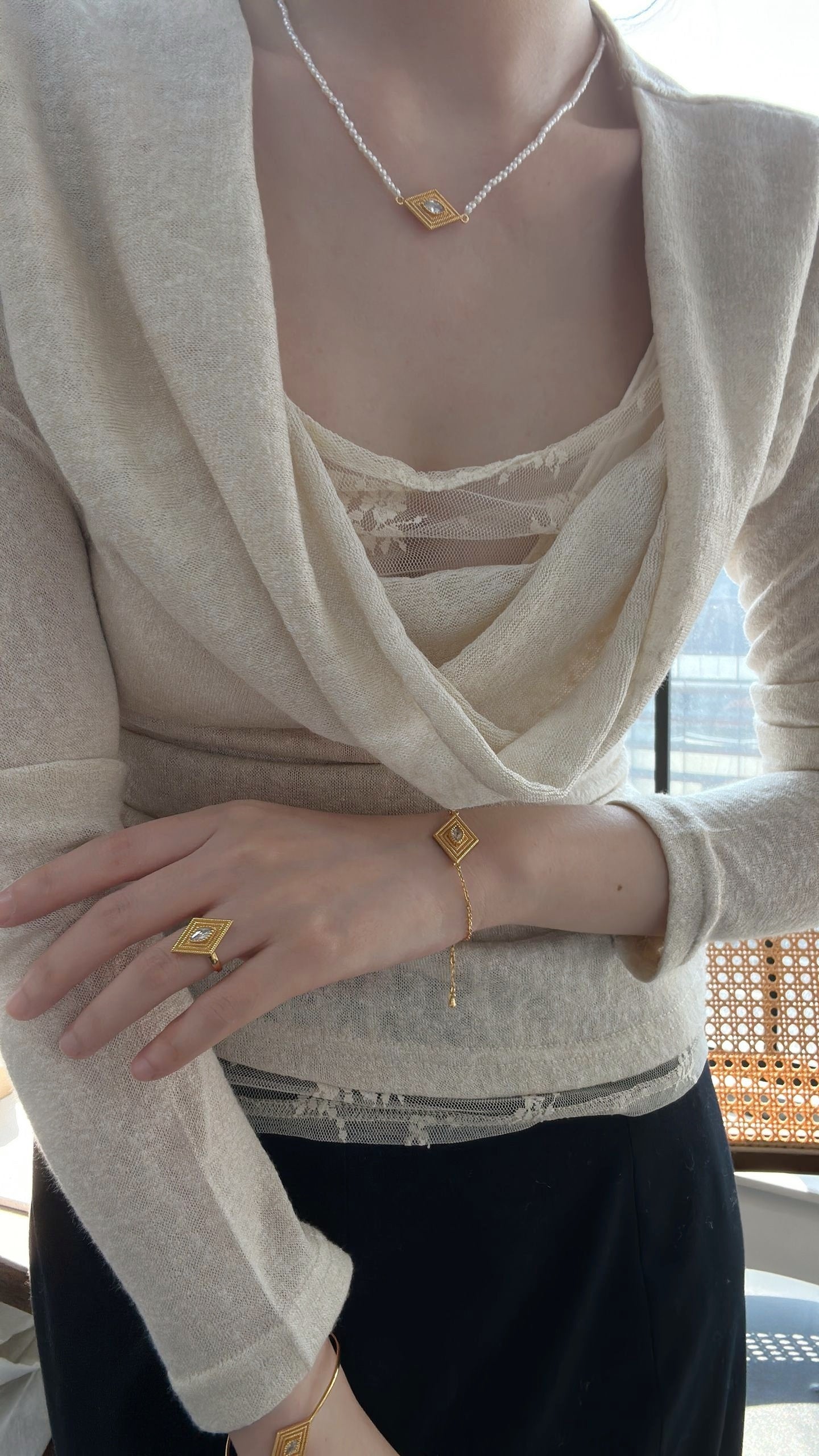 Collana di perle con occhio greco