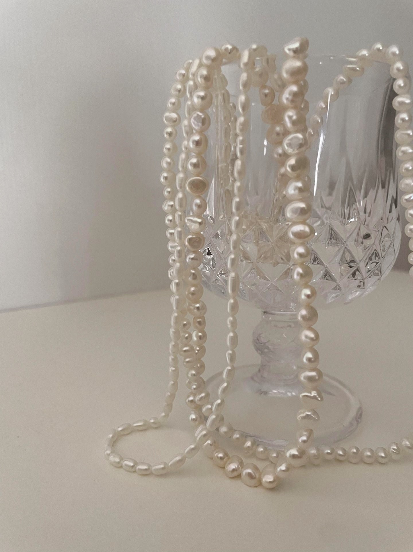 Collana di perle a tre fili