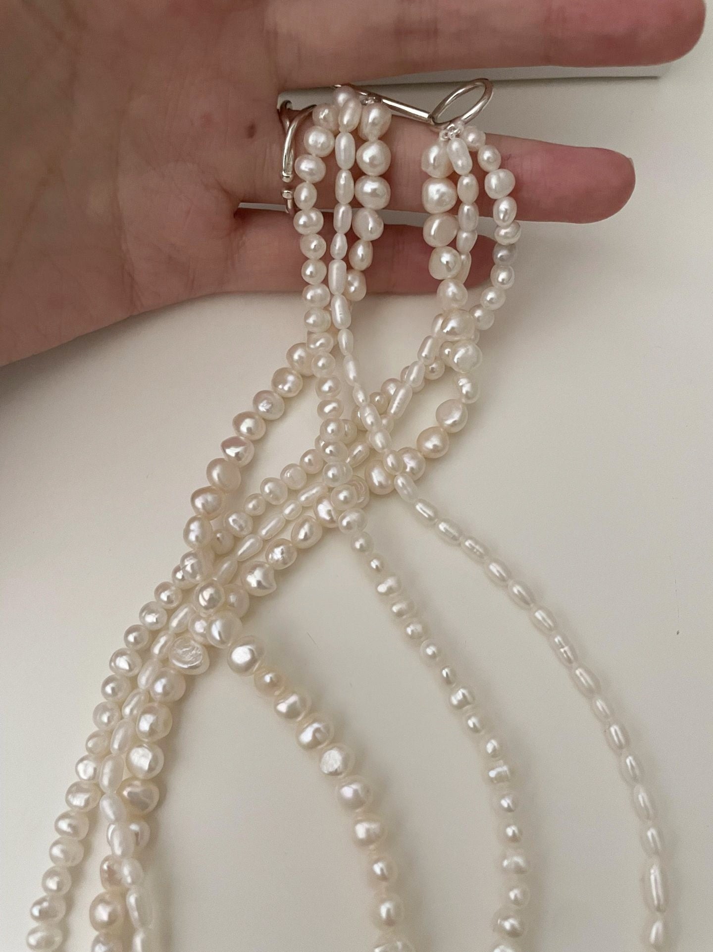 Collana di perle a tre fili