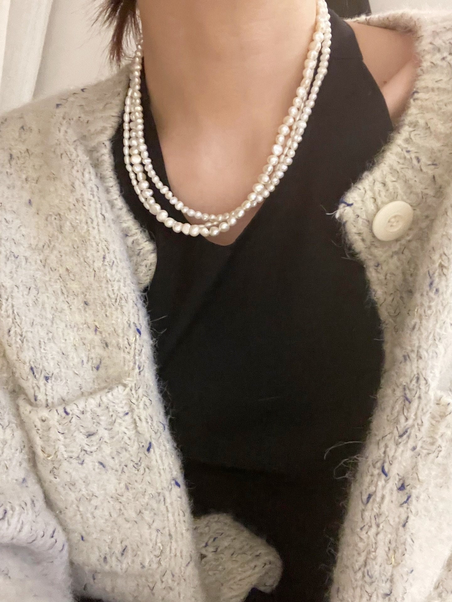 Collana di perle a tre fili
