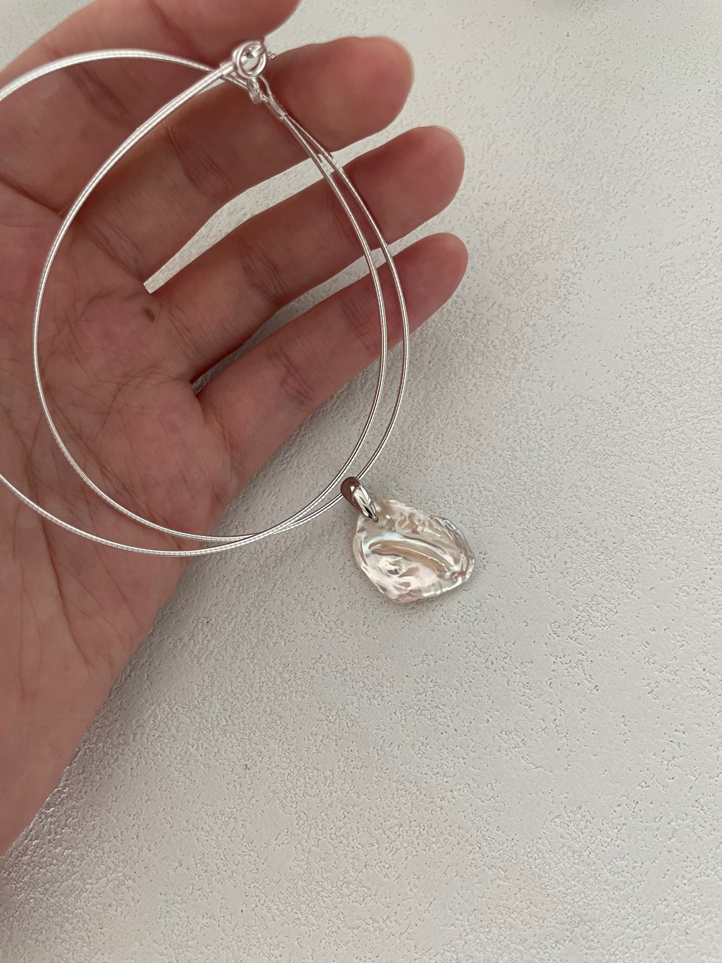 Girocollo d'argento con perla petala