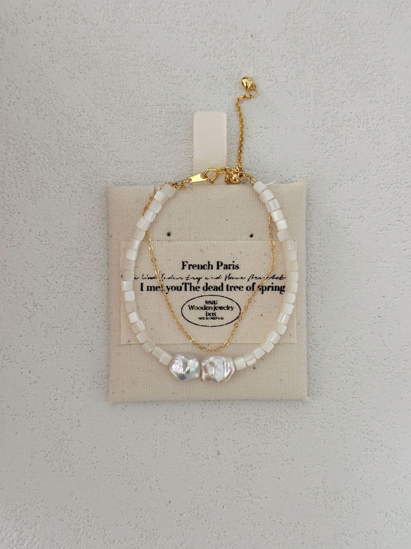 Bracciale a doppio giro con conchiglie e perle