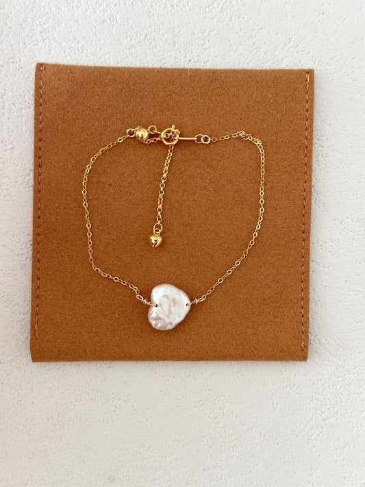 Bracciale d'oro con perle barocche di cuore