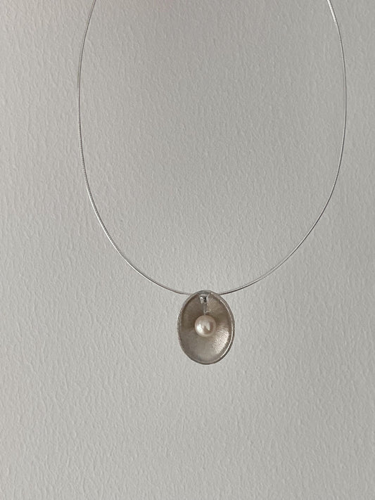 Girocollo in argento con perla forma di conchiglia