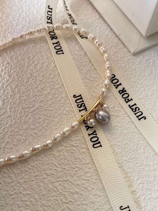 Collana barocche con perla grigia