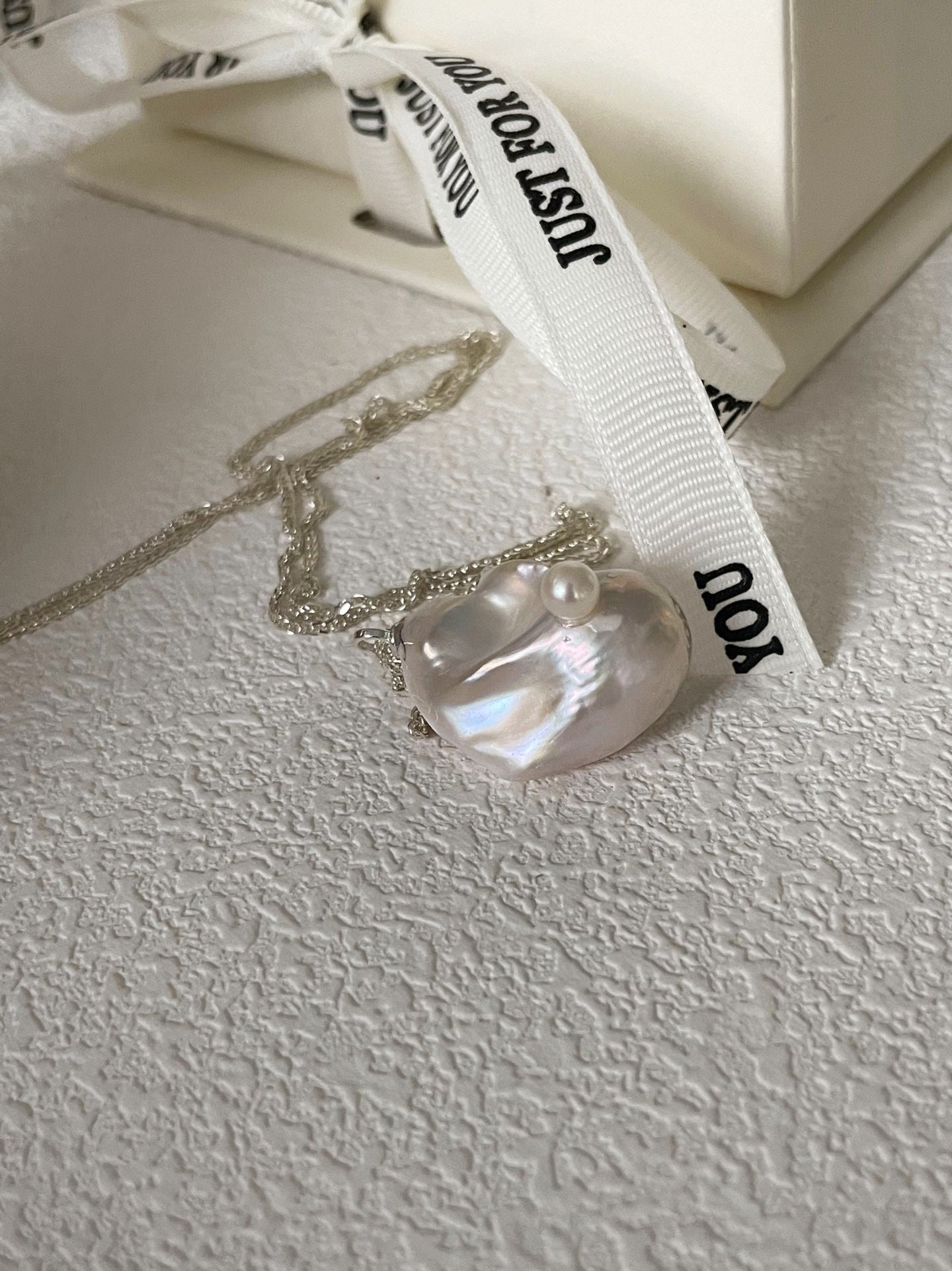 Collana d'argento con barocco Botero abbagliante