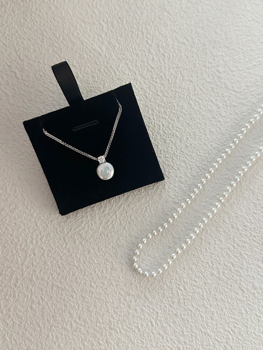 Collana in argento con ciondolo rotondo