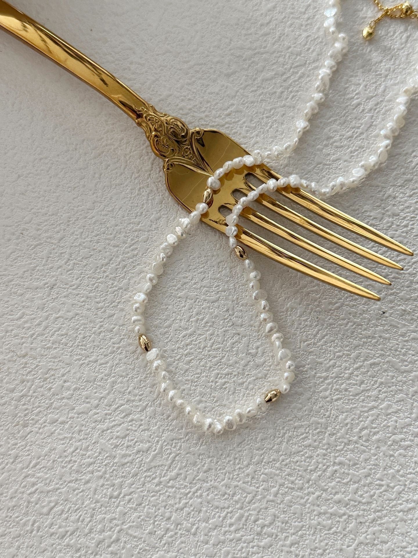 Collana di perle di riso