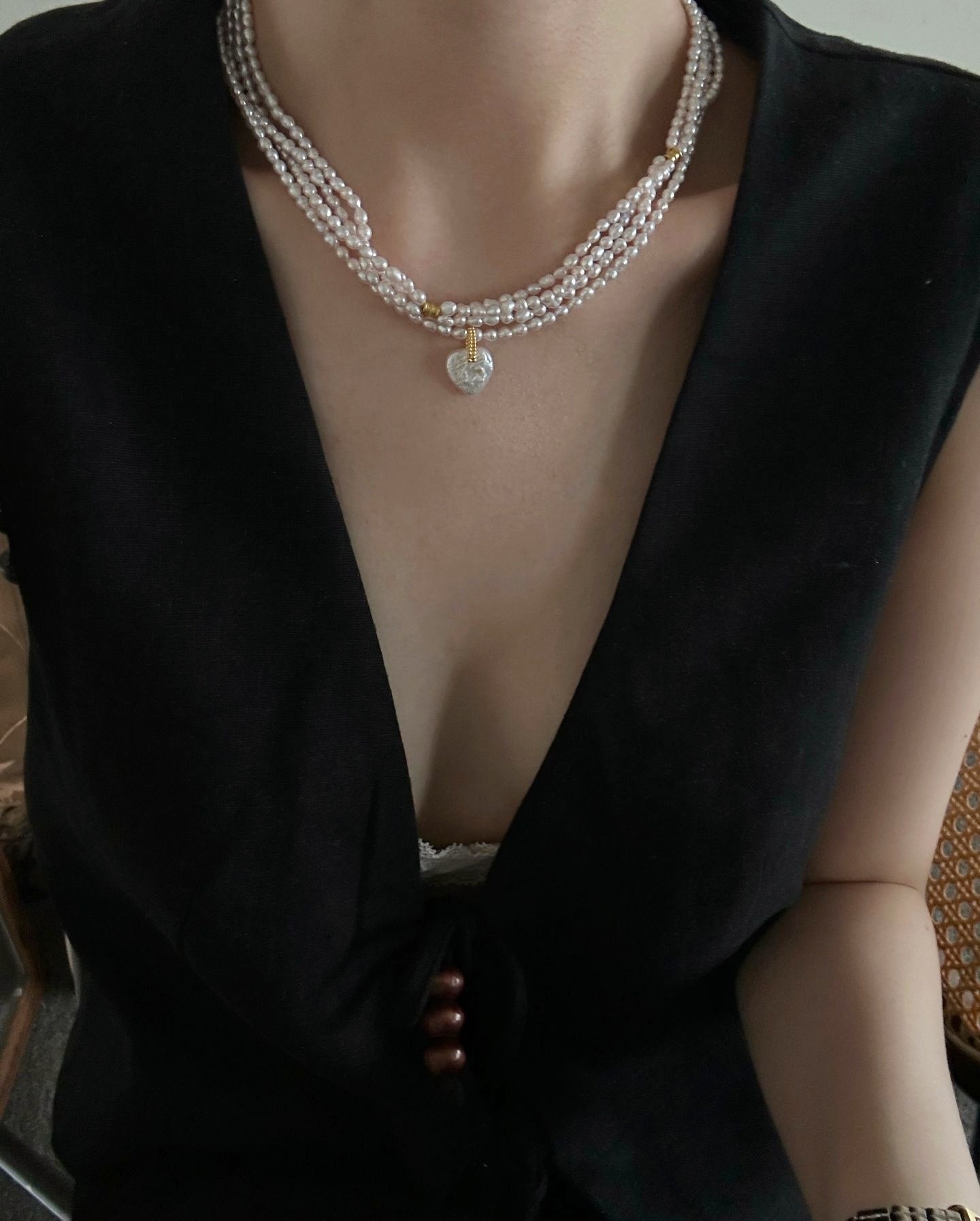 Collier di perle a tre fili