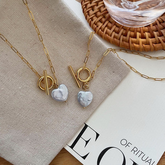Collier oro con perla barocca di cuore