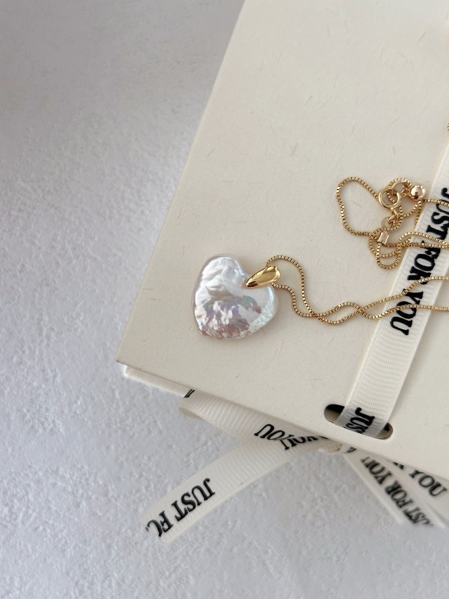 Collana d'oro con perla cuore