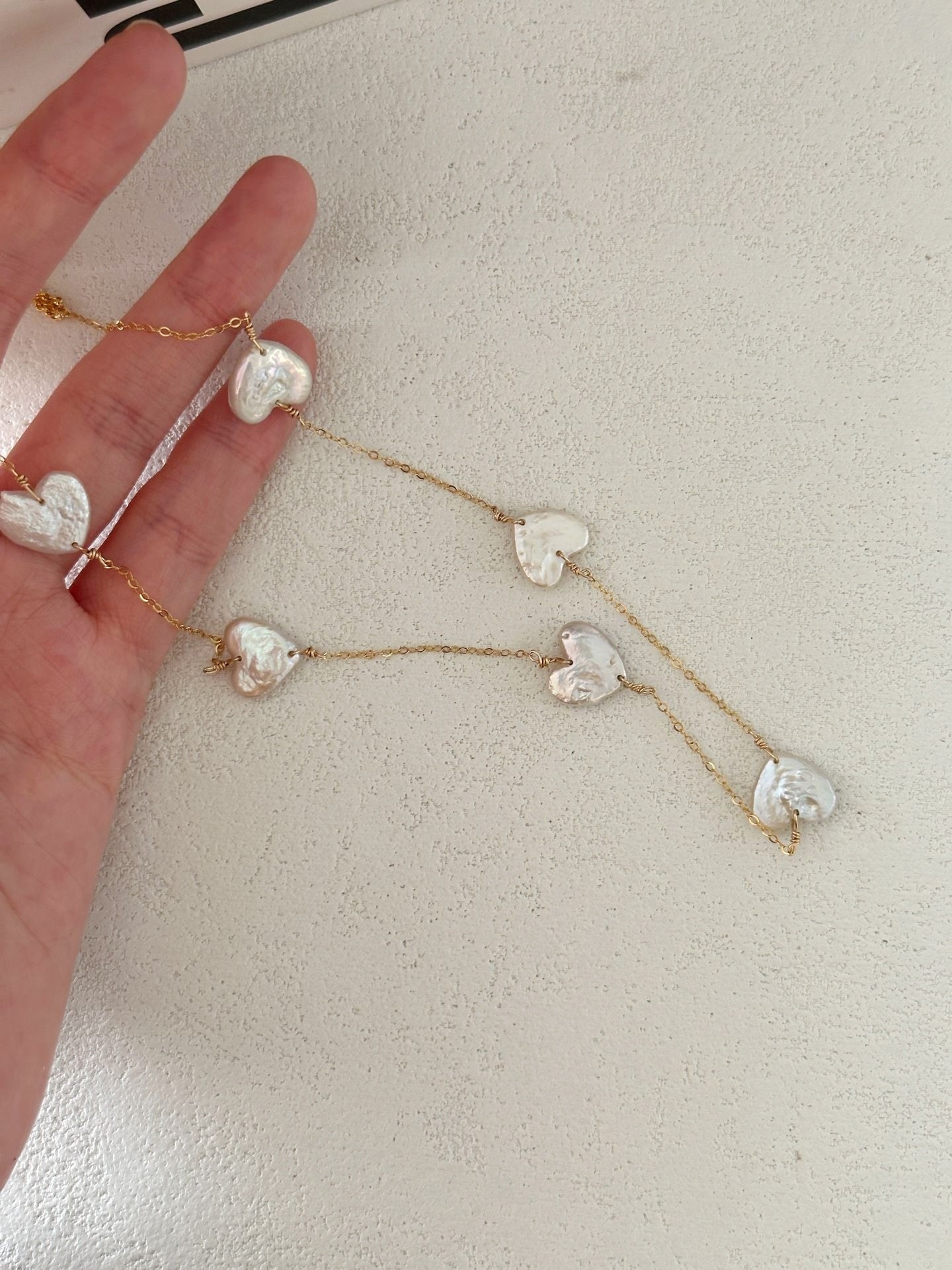 Collana con cuoricini a catena