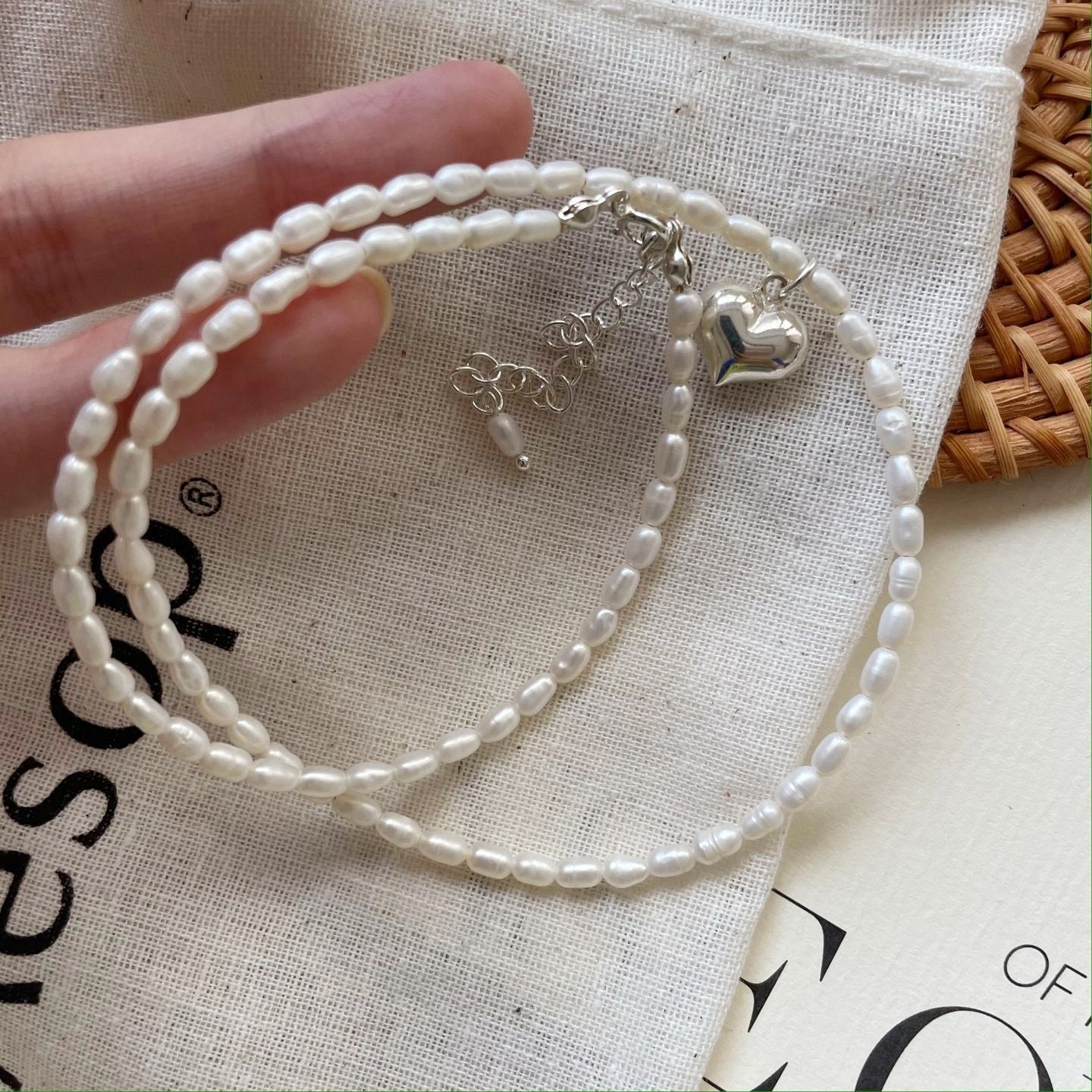 Collana di microperle con cuore