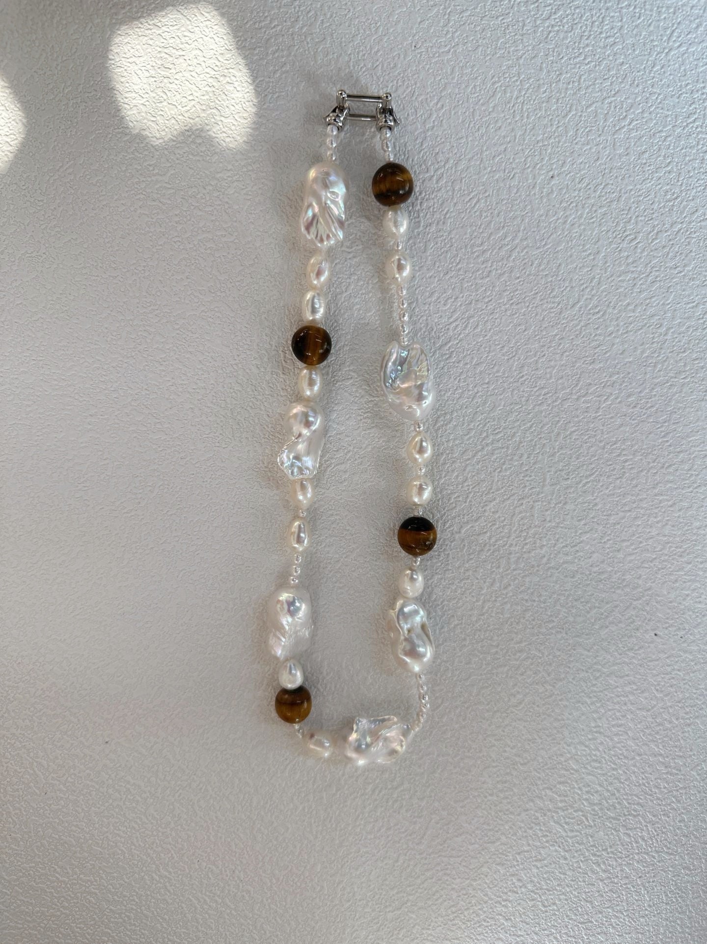 Collana di ambra e barocche