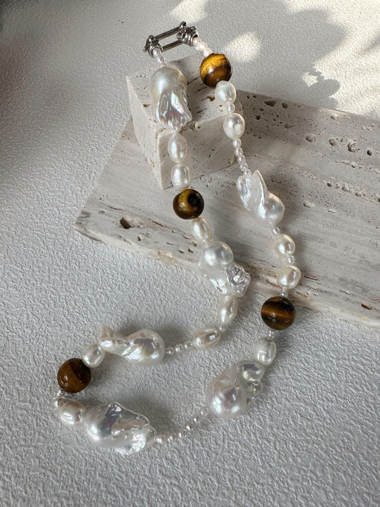 Collana di ambra e barocche