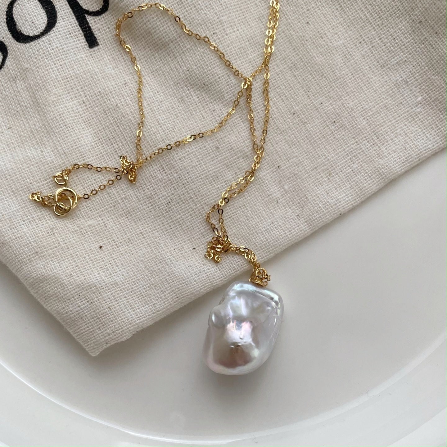 Collana di perle baroccha con oro 14k
