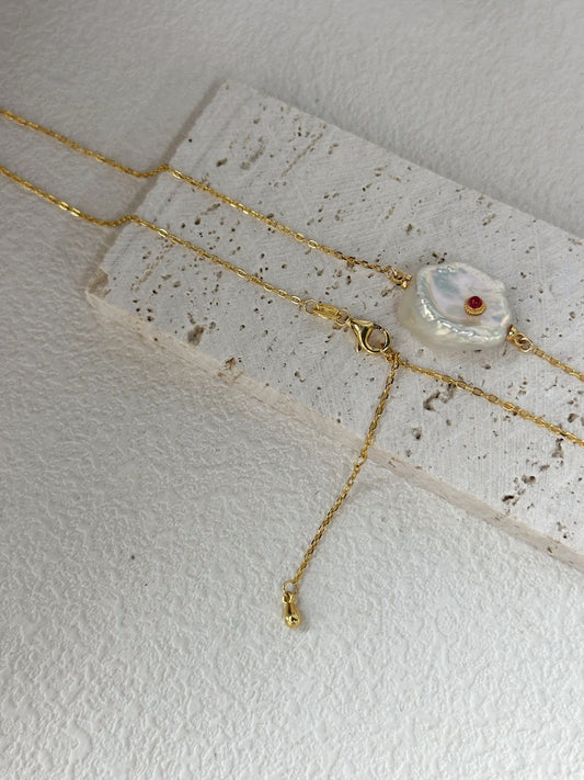 Collana di perle con malocchio