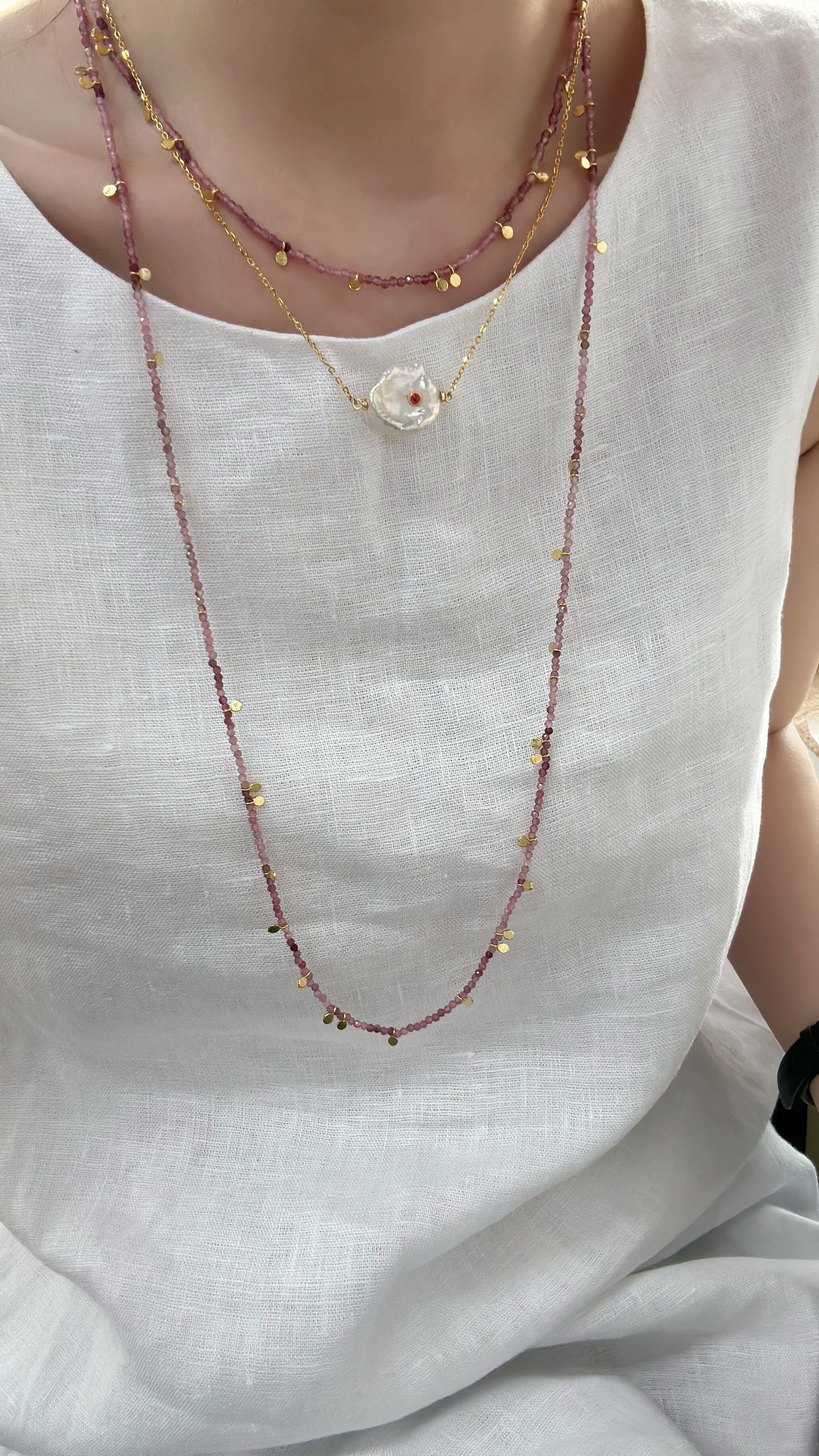 Collana di perle con malocchio