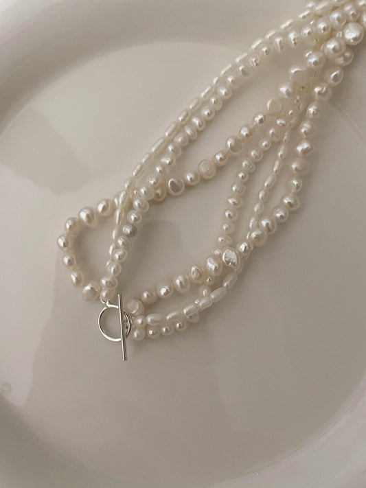 Collana di perle a tre fili